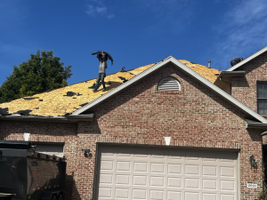 Ridge vent and soffit vents providing attic ventilation on an Illinois home
